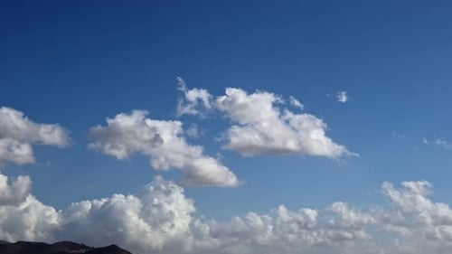 Time Lapse of Beautiful Fluffy Clouds in Blue Sky