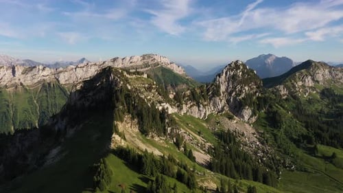 Lovely view of green mountains in the Alps during a sunny afternoon