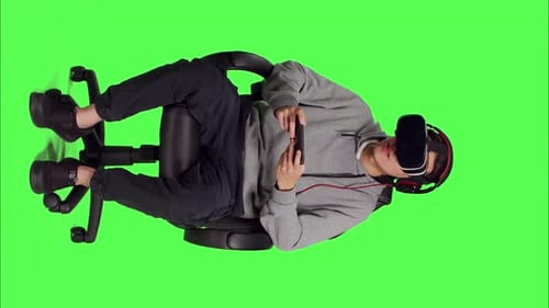 Front View of Adult Uses Vr Gadgets for Gameplay