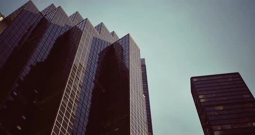 Modern Skyscrapers Rise Against a Clear Sky in an Urban Landscape