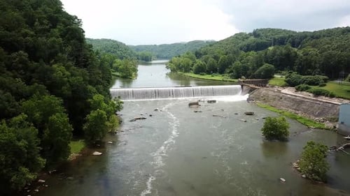 Fries Virginia aerial pullout of old textile plant site and hydroelectric plant along new river