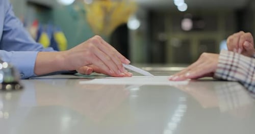 Close Up Woman Signs Papers Takes Keys and Talks to Female Woman Signs Papers Takes Keys and Talks