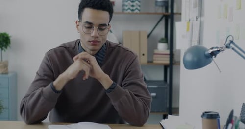Portrait of Businessman Speaking and Writing During Virtual Meeting Making Video Call From Office