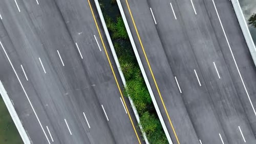 Drone aerial view above new intercity motorway without car.