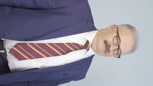 Vertical video of Negative businessman.