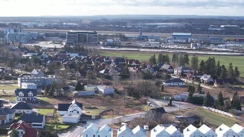 Residential area around Polish airport in Gdansk, Poland. Aerial drone view
