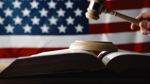 US Supreme Court with gavel on a book
