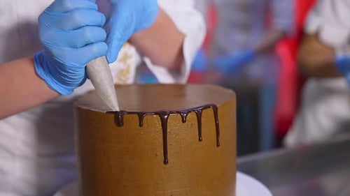 Cake decoration with chocolate. Close up.