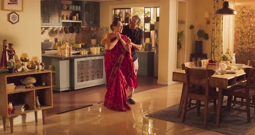 Loving Couple Embracing in Warm Home Interior