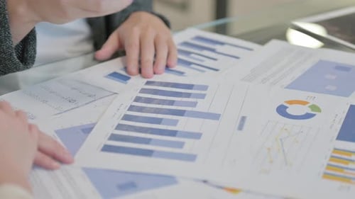 Hand Close up of People Working on Documents