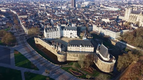 Panning drone fly of the medieval Castle of the Dukes of Brittany, Nantes, Loire-Atlantique, France