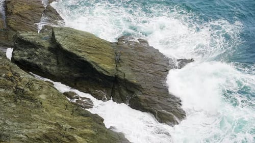Crashing Waves Smashing Against A Rocky Shoreline In Stormy Weather Beautiful Slow Motion