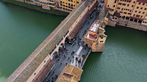 panoramic drone view of ponte vecchio and the arno river