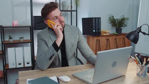 Business Man in Suit Working Having Mobile Phone Talk at Office Workplace Using Messenger Chat Apps