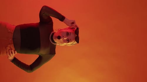 Stylish Young Woman Posing in Warm Lighting