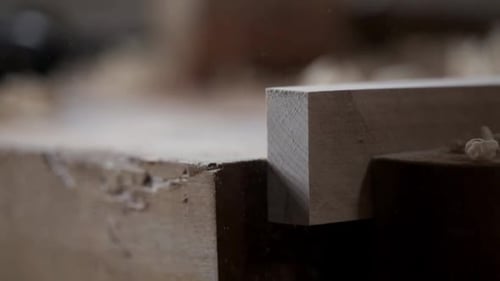 Close Up of Carpenter Smoothing Wood Block with Sandpaper 3539 Years