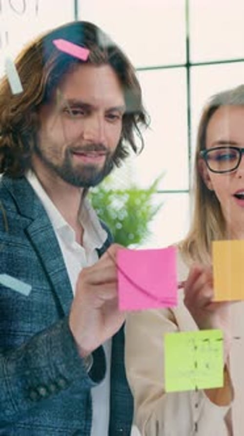 Business Concept Where Pleasant Inventive Professional Man and Woman Creators of Design Office