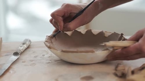 Potter Shaping Clay Bowl in Bright Studio