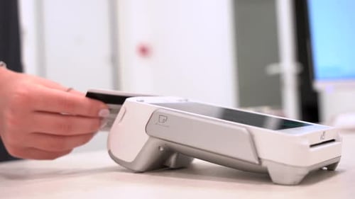 Swiping a Credit Card Through Card Reader
