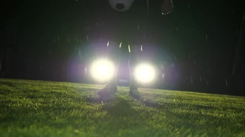 Soccer Player Athlete Training Foot Ball Sport on Soccer Field at Night