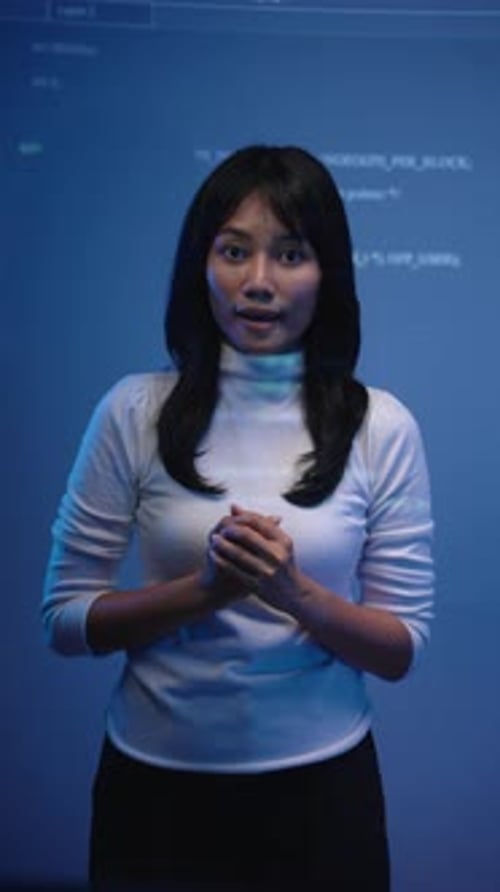 Asian female coder presenting a programming lecture