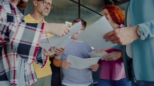 Disabled Person Standing in Circle of Colleagues with Smile