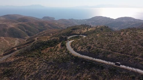 Aerial view of winding road through mountains and valley, Turkey.