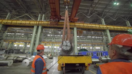 The Operation of Heavy Machinery Within an Industrial Warehouse Setting is Critical to Success Stock