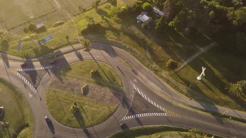 A drone birdseye view of a roundabout in a city of Uruguay