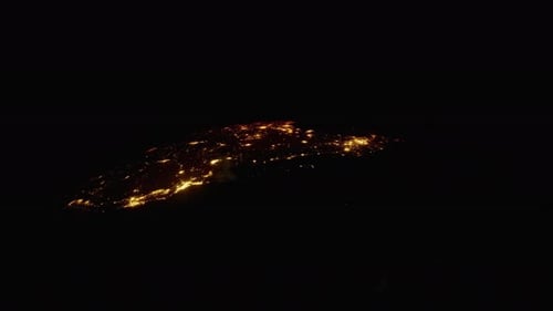 The West Coast of the United States of America and Mexico, as seen from high above in orbit. Sunrise