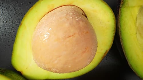 Half avocado macro video. 4K