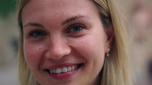 Smiling Woman Close Up Portrait in Daytime