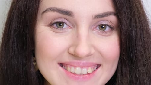 Attractive Woman Smiles in Extreme Close-Up
