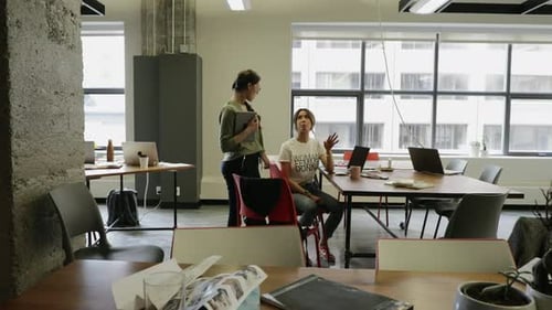 Creative Businesswomen Talking in Open Plan Office 2024 Years