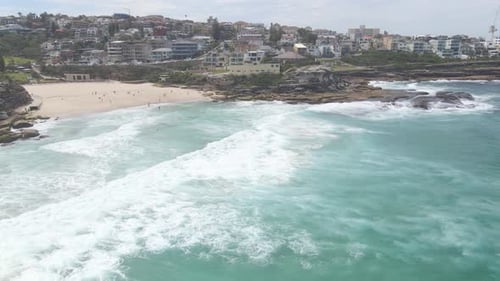 Waves Crashing On Rocky Cliff In Tamarama. Mackenzies Point In Eastern Suburbs Of Sydney, Australia.