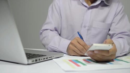 Paperwork, Laptop and Smartphone