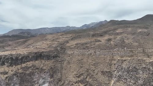 Aerial panorama drone shot of a nature landscape with mountains and a breathtaking view in the dista