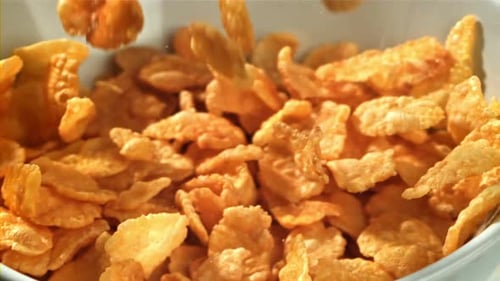 Cornflakes Fall Into a Plate Filmed on a Highspeed Camera at 1000 Fps
