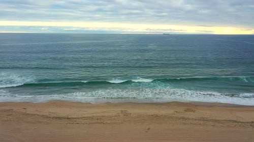 Aerial View Of Empty Beach With Scenic Blue Ocean In Manhattan Beach, California, USA. - sideways