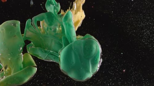 Phantom flex 4k captures vibrant ink swirls mixing into oil a mesmerizing abstract