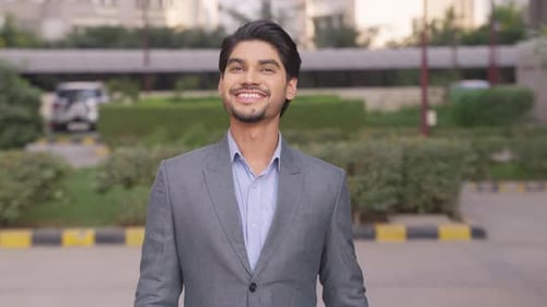 Happy Indian Businessman Walking