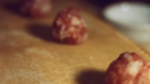 Close Up of Preparing Raw Meatballs in Kitchen