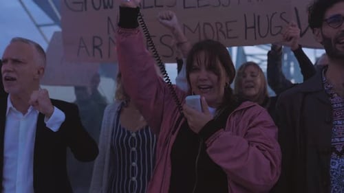 Group of People Protesting and Shouting
