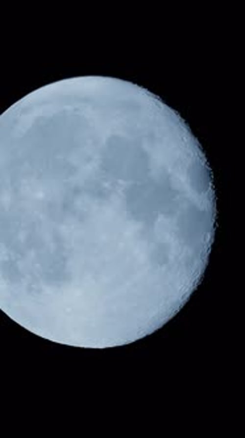 Close Up of Half Moon in Black Sky