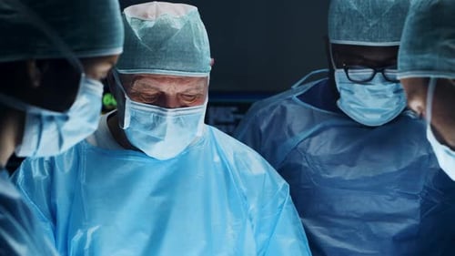 Medical Professionals Perform Surgery in Hospital Operating Room