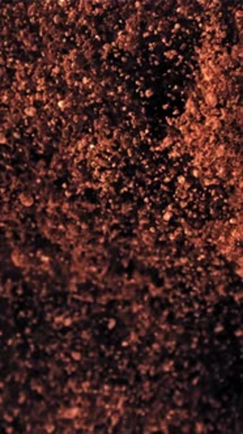 Ground Coffee Flies Up and Falls Down Filmed on a Highspeed Camera at 1000 Fps