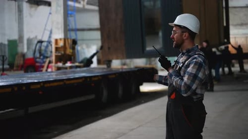 Construction Supervisor Managing Modular Home Loading Process