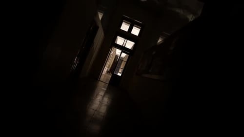 Creepy Hallway Dolly Towards Dark Doorway