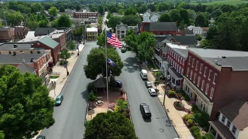 Aerial View of American Main Street with US Flag