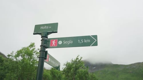 Sign Post In Hiking Trail, Segla, Senja, Norway. - Low-Angle Shot